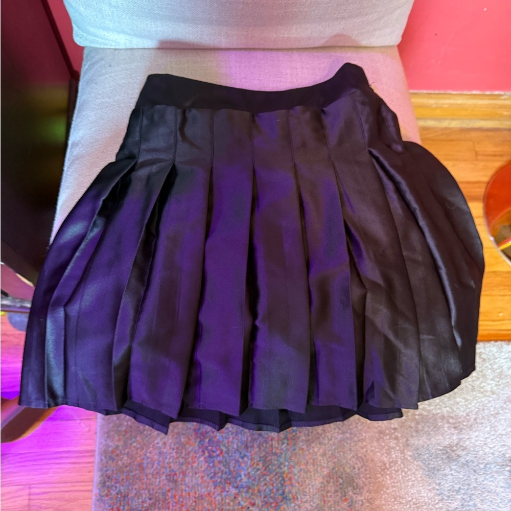 Elegant Black Pleated Skirt with shorts underneath